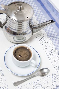 Composition of the classic coffee cup espresso on a table.