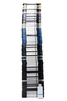 Vertical pile of computer floppy disks with usb disk isolated on a white background.