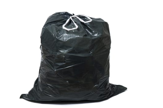 Green trash bag isolated on a white background.