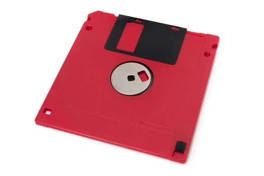red computer floppy disk, back view, isolated on a white background.