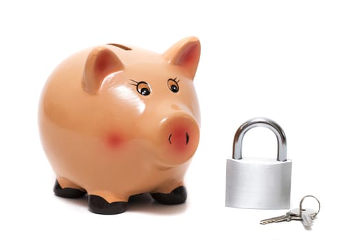 Close up view of a cute pink piggy bank with lock isolated on a white background.