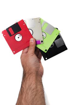 hand with floppy disks isolated on a white background.