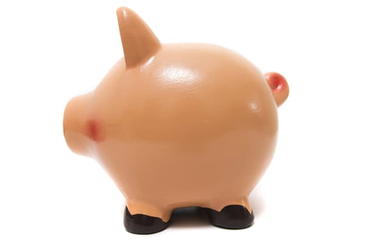 Close up view of a cute pink piggy bank isolated on a white background.