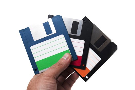hand with floppy disks isolated on a white background.