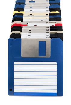 horizontal row of computer floppy disks isolated on a white background.