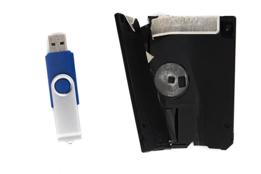 destroyed floppy disk and usb disk isolated on a white background.