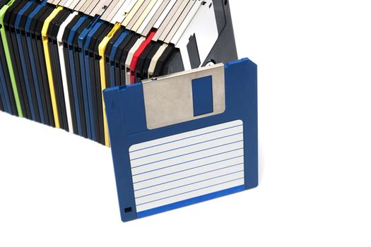 horizontal row of computer floppy disks isolated on a white background.