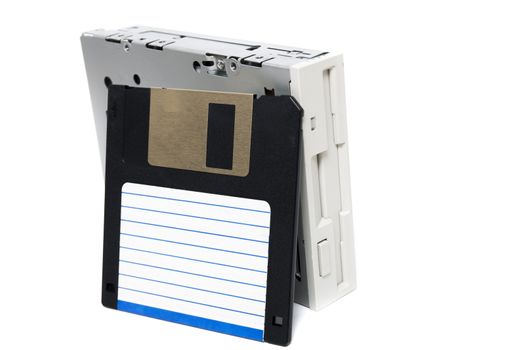 Closeup view of a computer floppy drive, isolated on a white background.