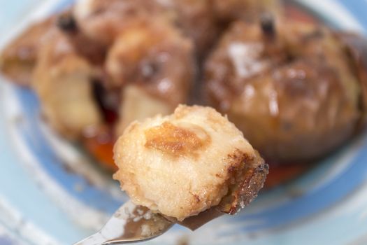 Oven baked apples with cinnamon, sugar honey and red wine.