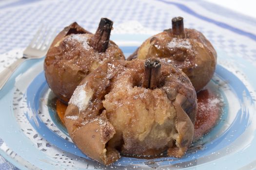 Oven baked apples with cinnamon, sugar honey and red wine.