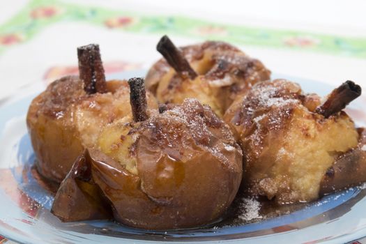Oven baked apples with cinnamon, sugar honey and red wine.