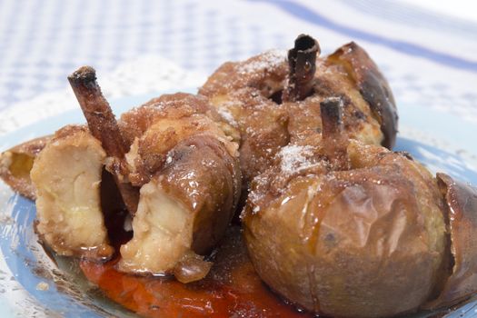 Oven baked apples with cinnamon, sugar honey and red wine.