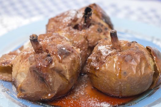 Oven baked apples with cinnamon, sugar honey and red wine.
