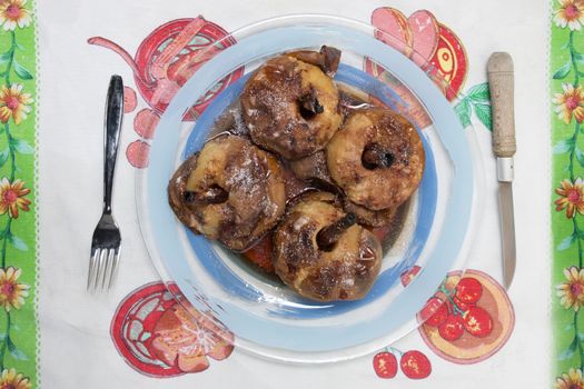 Oven baked apples with cinnamon, sugar honey and red wine.