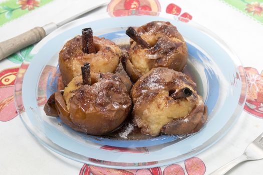 Oven baked apples with cinnamon, sugar honey and red wine.