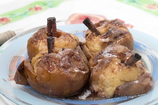 Oven baked apples with cinnamon, sugar honey and red wine.
