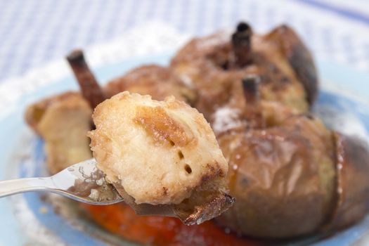 Oven baked apples with cinnamon, sugar honey and red wine.