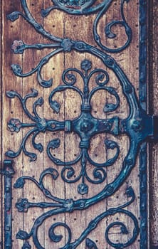Background Texture Of An Ornate Hinge On A Church Door