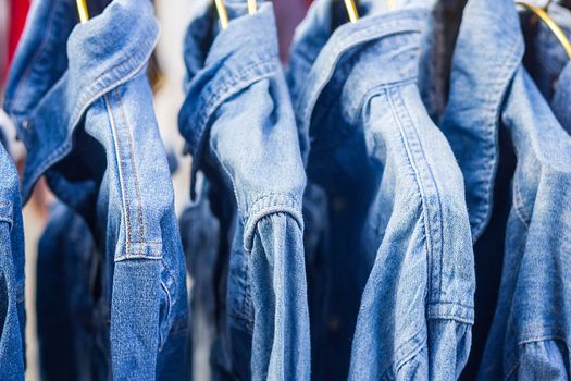 Jeans shirt sold in the market, close-up of jeans jacket 