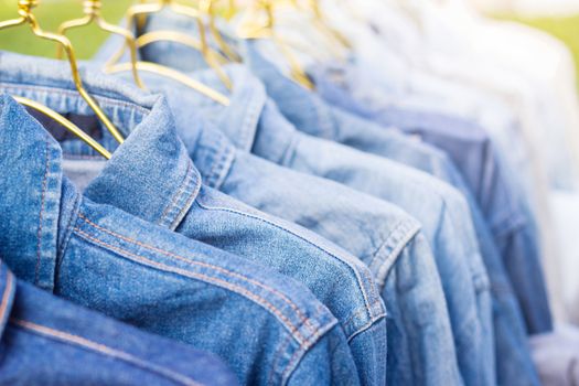 Jeans shirt sold in the market, close-up of jeans jacket 