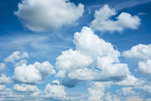 white fluffy clouds in the blue sky, for background