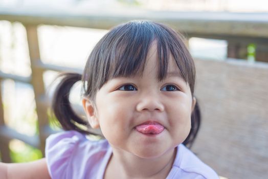 Portrait of cute children smiling girl is happy.