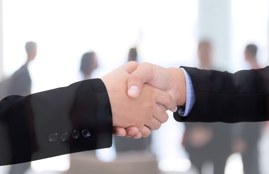 business handshake with city background, Double exposure style.