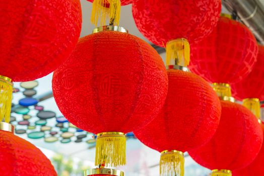 Traditional red lantern hanging in Chinese Temple.