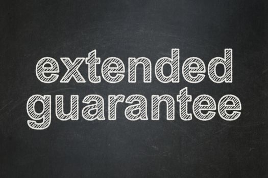 Insurance concept: text Extended Guarantee on Black chalkboard background