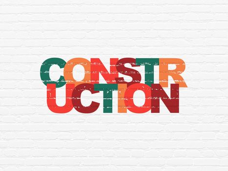 Building construction concept: Painted multicolor text Construction on White Brick wall background