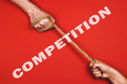 A man and a woman pull the rope. The concept of competition and the right to vote.