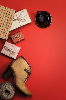 The holiday gifts on a red background, the concept of black Friday, sales.