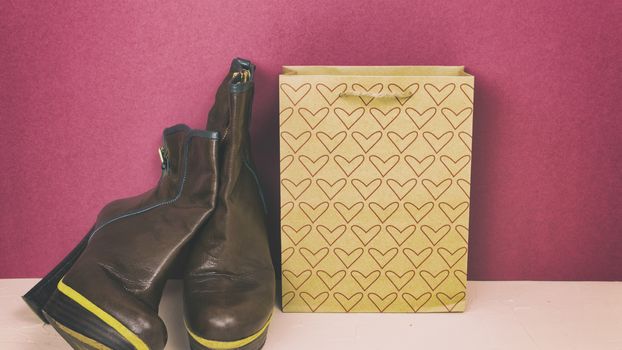 Ankle boots on a colored background