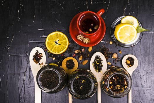 Tea in mugs and wooden spoons