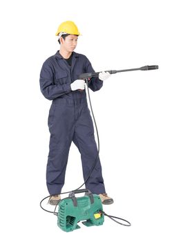 Young man in uniform stand and holding high pressure water gun portable with hose, Cut out isolated on white background