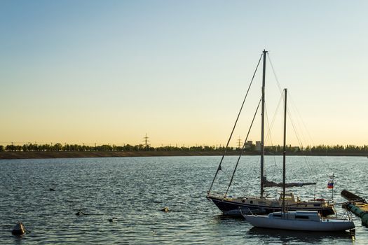 boats on the river sunset river Volga port of ships