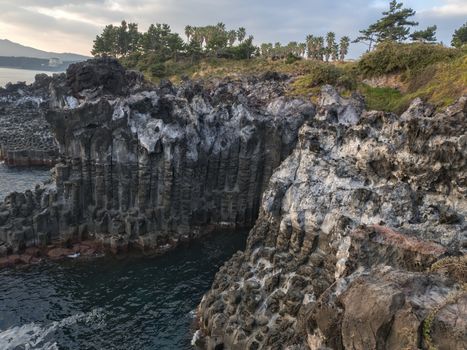 daepo jusangjeoli cliff seaside landscape in jeju south korea