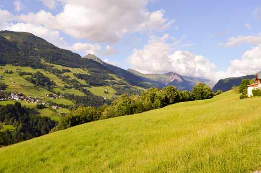 View of a valley and green hills in the Austrian Tyrol