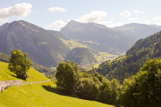 View of a valley and green hills in the Austrian Tyrol