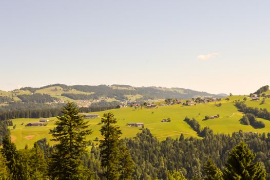 View of a valley and green hills in the Austrian Tyrol