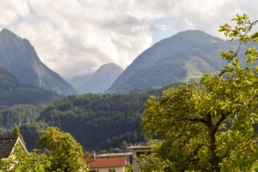 View of a valley and green hills in the Austrian Tyrol