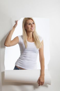 attractive young blonde woman on white background