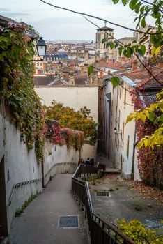 Stairs and view over the roofs of Lyon in France