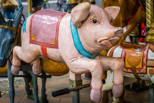Wooden pig on a merry-go-round in France