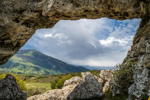 View out of cave in the mountains in France