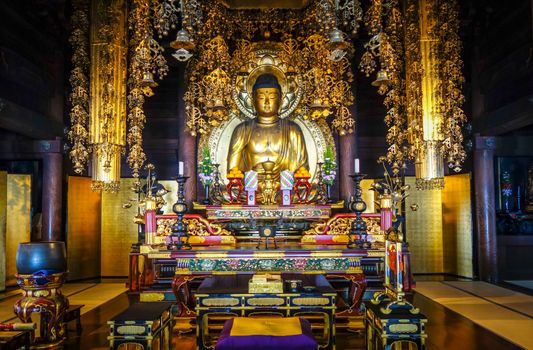 Golden Buddha inside Chion-In Temple, Kyoto, Japan