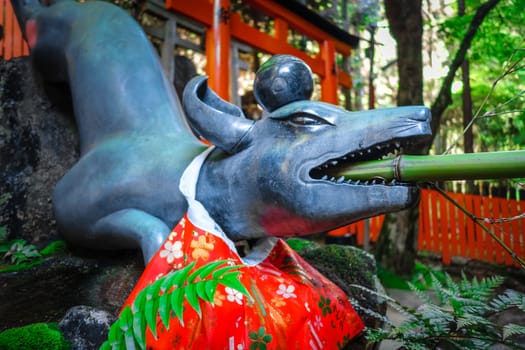 Fox purification fountain at Fushimi Inari Taisha torii shrine, Kyoto, Japan