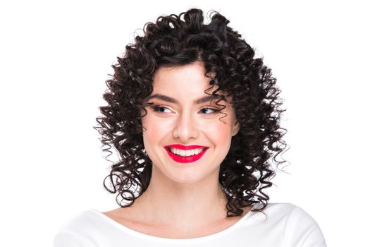 Portrait of amazing beautiful smiling woman with curly hair isolated on white background
