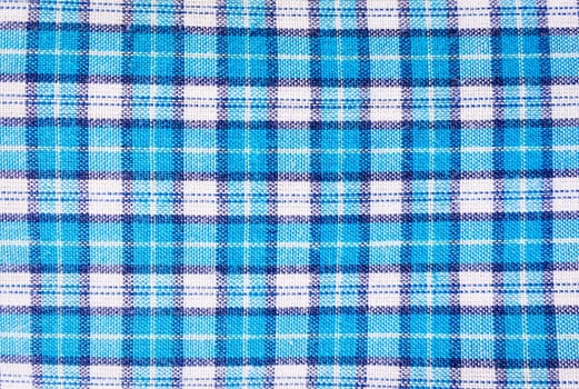 textile blue box, fabric blue plaid cover. Blue classic checkered pattern. blue checkered fabric closeup , tablecloth texture