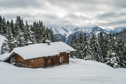 Chalet lost in the mountain with a lot of snow in Switzerland